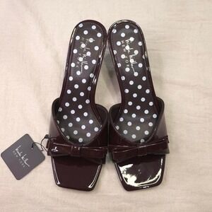 Billabong Home Abroad Backpack black + purple floral backpack with tan accents